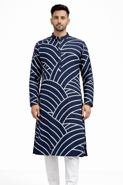 Man wearing a navy blue kurta with white patterns on a white background