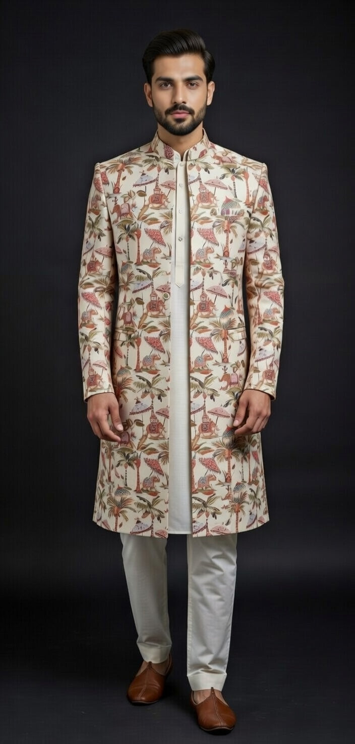 Man wearing a patterned kurta with light-colored pants against a dark background