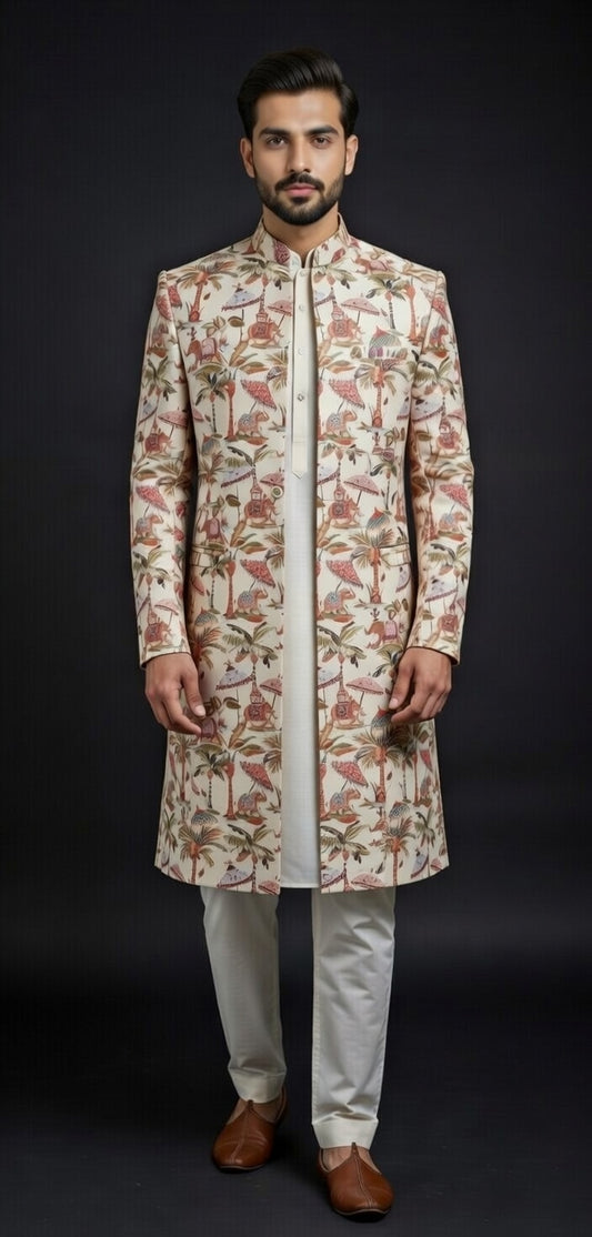Man wearing a patterned kurta with light-colored pants against a dark background