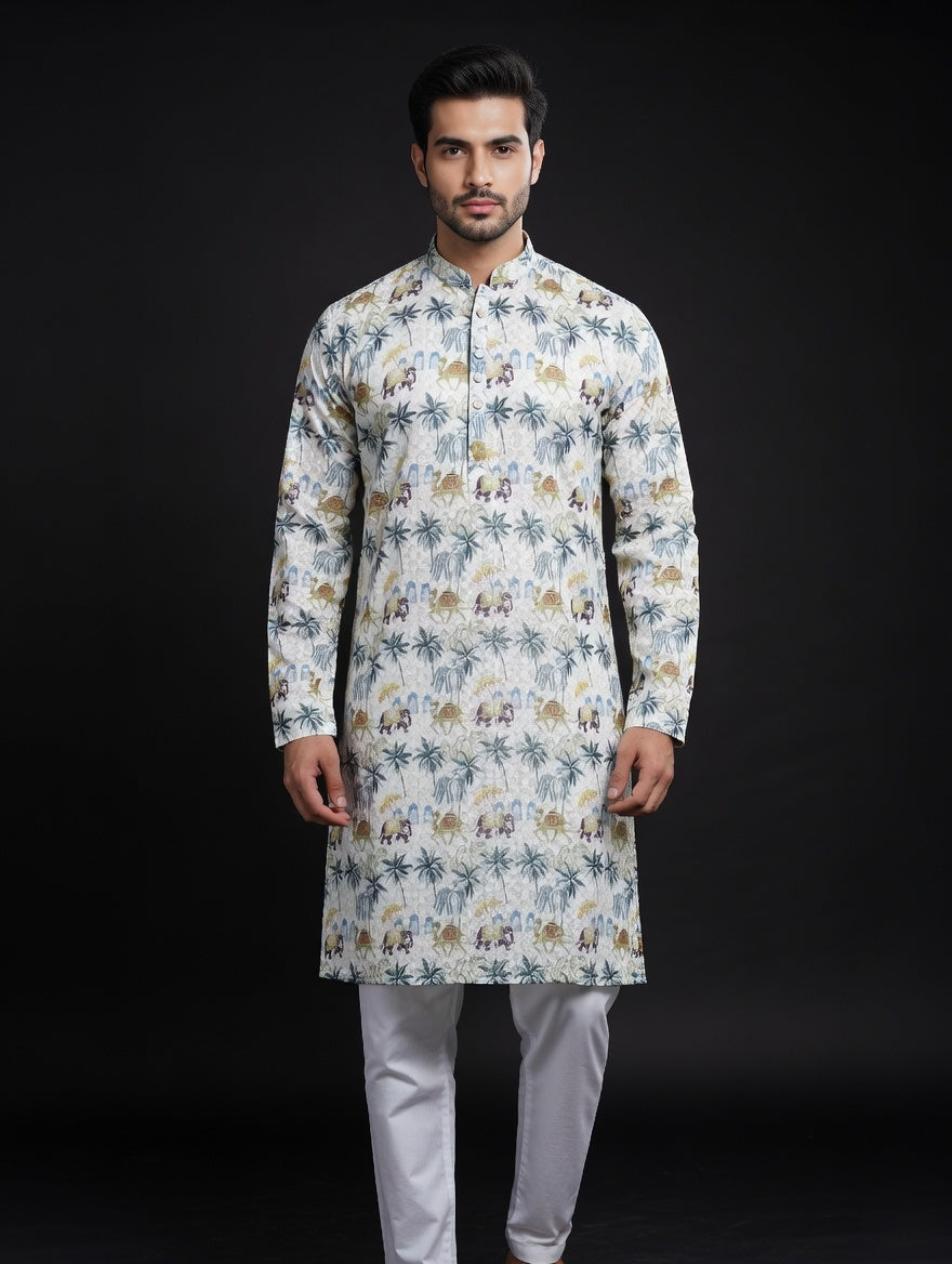 Man wearing a floral kurta with white pants on a black background