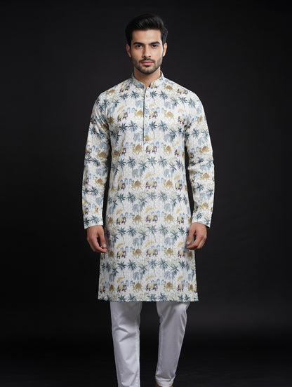 Man wearing a floral kurta with white pants on a black background