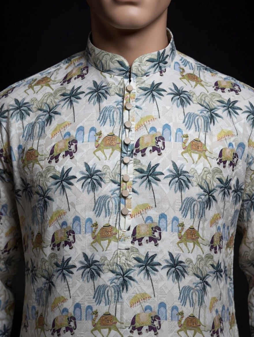 Mannequin wearing a patterned shirt with elephants, palm trees, and camels on a white background. kurta, sangeet, wedding, occassion