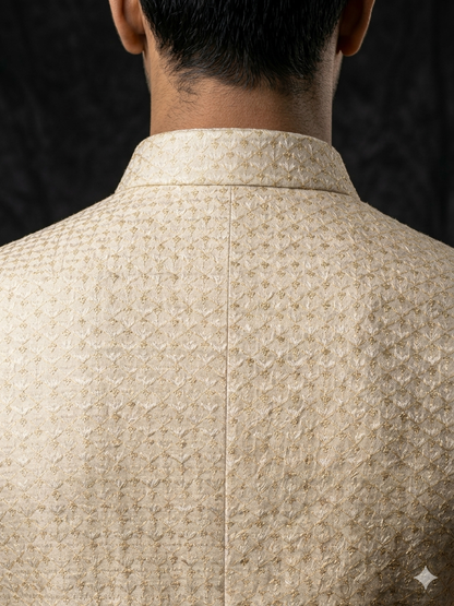 Close-up of a beige textured jacket on a dark background